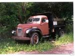 1948 International K5 dump truck
4-speed manual transmission with 2-speed rear axle, and is powered by a 6 cylinder Green Diam